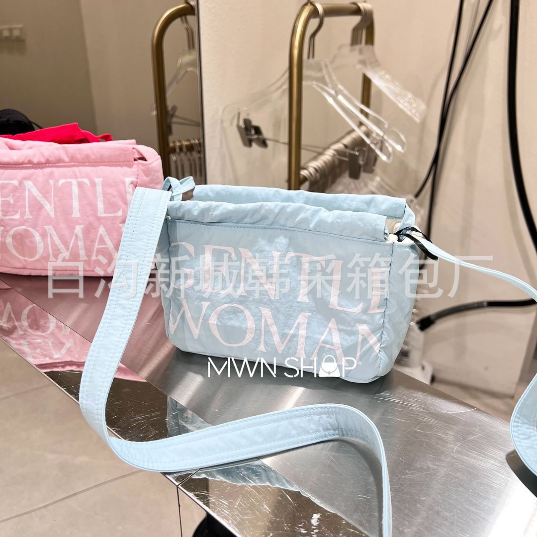 Diseño de nicho de mini albóndigas de la marca tailandesa de moda Gentle Woman 2024 nuevo bolso de hombro con cuerda de extracción