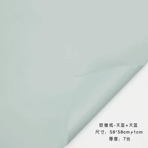 Tangde fábrica directa de doble cara de dos colores papel Ouya engrosada impermeable regalo flor papel de embalaje al por mayor