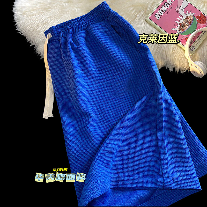 Directo de fábrica de verano de color sólido waffle shorts hombres de moda simple marca suelta quinta pantalones juventud Pantalones rectos