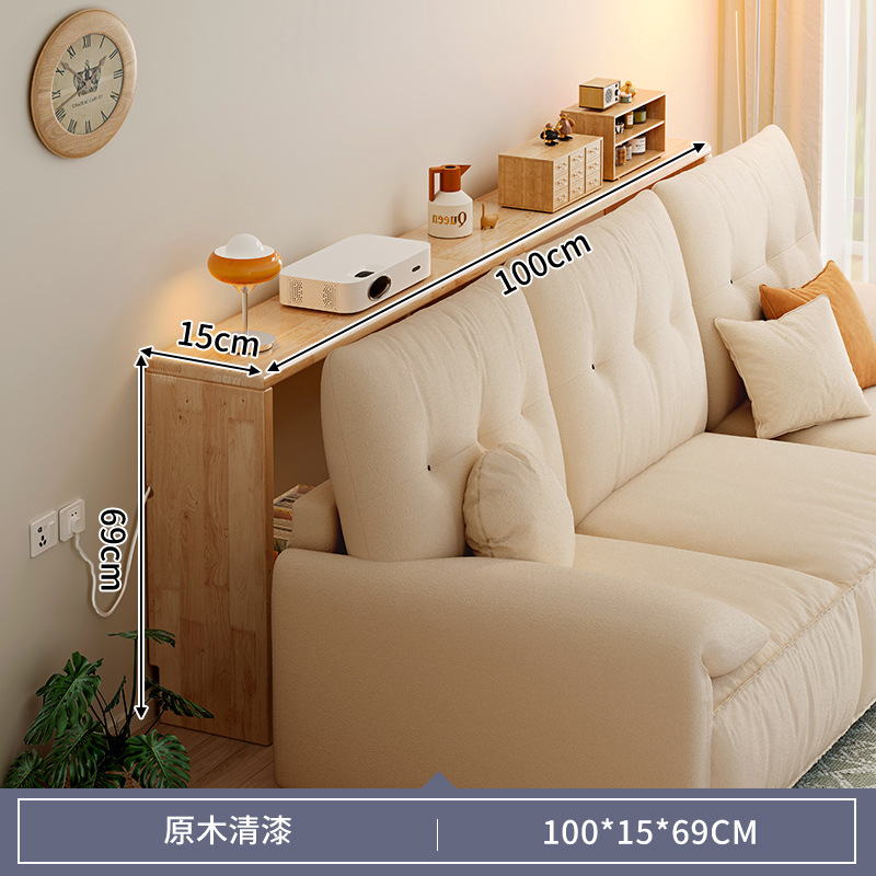 木製のソファーの後ろの棚の長い棚は壁に寄りかかっています。|undefined
