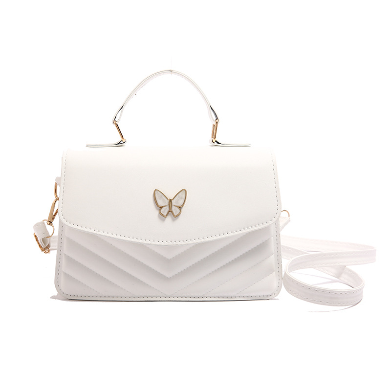 Bolso bordado de color sólido otoño y invierno 2024 nuevo estilo retro bolso de moda simple bolso de mariposa de moda