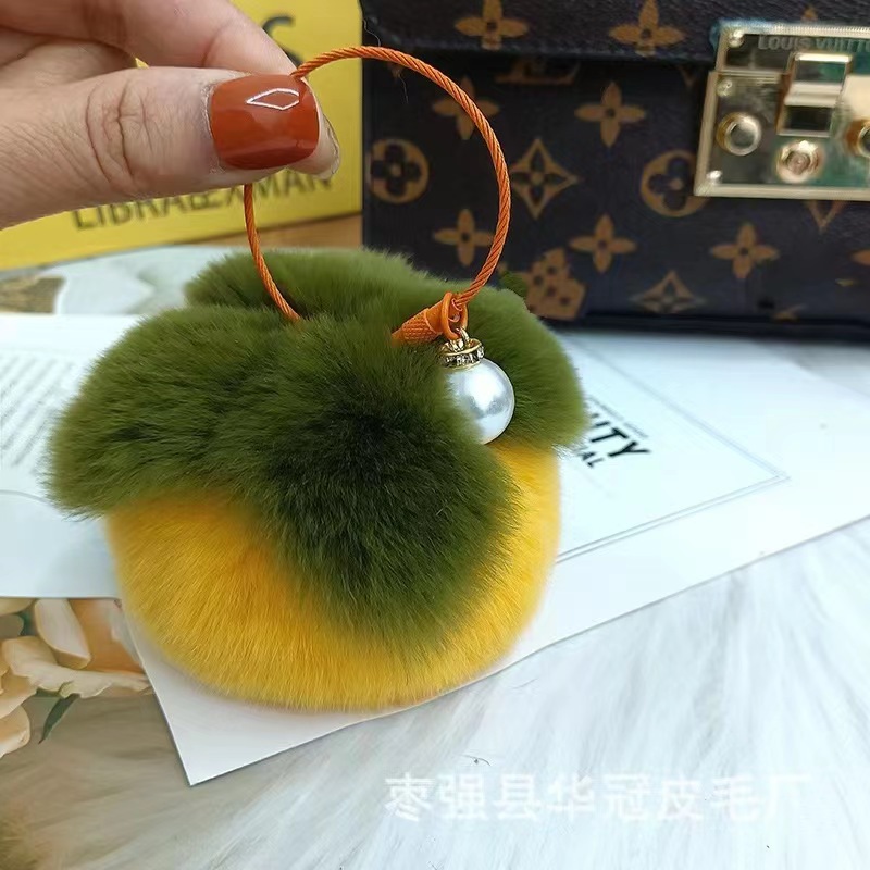 Imitación de piel de conejo Rex buena cosa sucedió Caqui colgante de peluche bola llavero bolsa de joyería teléfono móvil adornos hechos a mano de piel