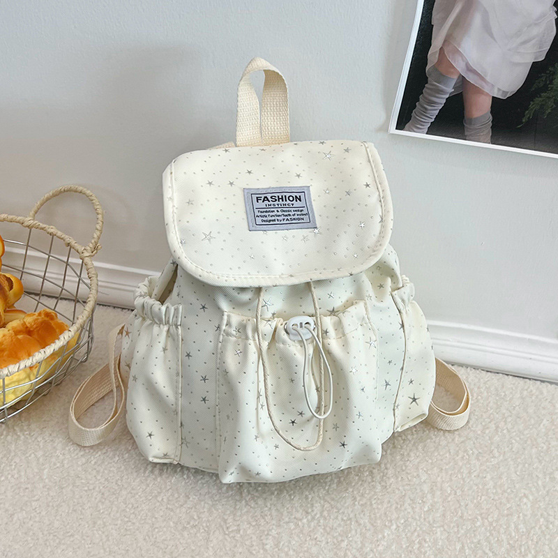 Primavera nuevo estilo ins leche de viento bonito joven estrella impresa mochila de hombro para mujeres de alto valor dulce mochila pequeña