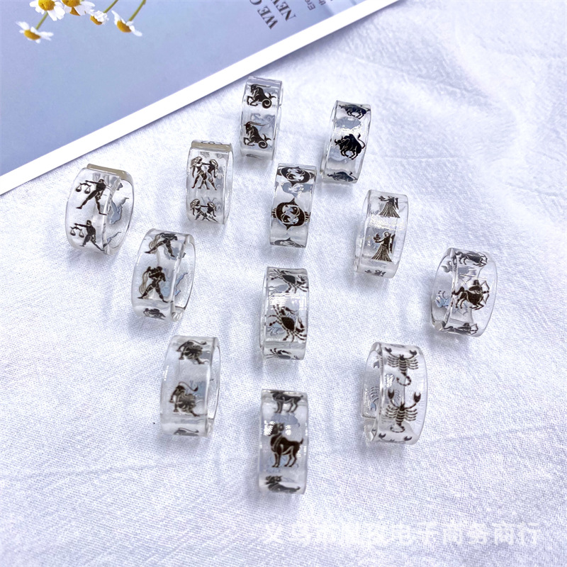 Nuevo 12 constelación patrón acrílico resina anillo transparente personalidad ajustable anillo transfronterizo Venta caliente exclusivo
