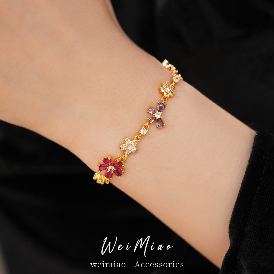 Oro verdadero, pulseras de arco de flores de piedra, pulseras de nicho lujosas, exquisitas joyas de moda al por mayor.