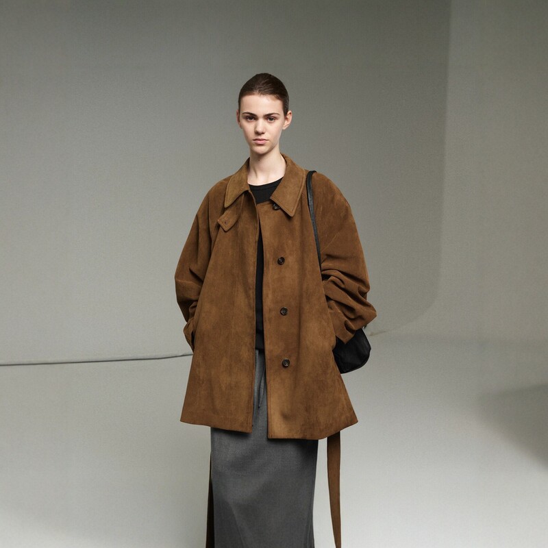 Nothing written. Suede leather jacket for women, new autumn/winter style, mid-length trench coat with a sophisticated look and tie detail