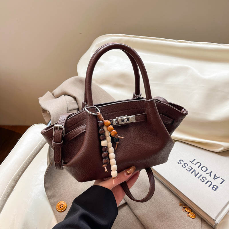 Bagos de banquete de lujo ligero de alto nivel nicho de viaje de hombro 2025 nuevo bolso de mochila explosivo para mujeres