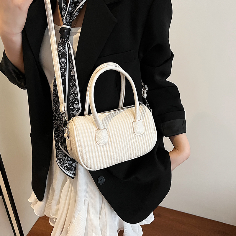Bolso de moda coreano 2025 verano nuevo bolso femenino bolso de hombro a rayas casual bolso de mensajero con patrón de lichi simple