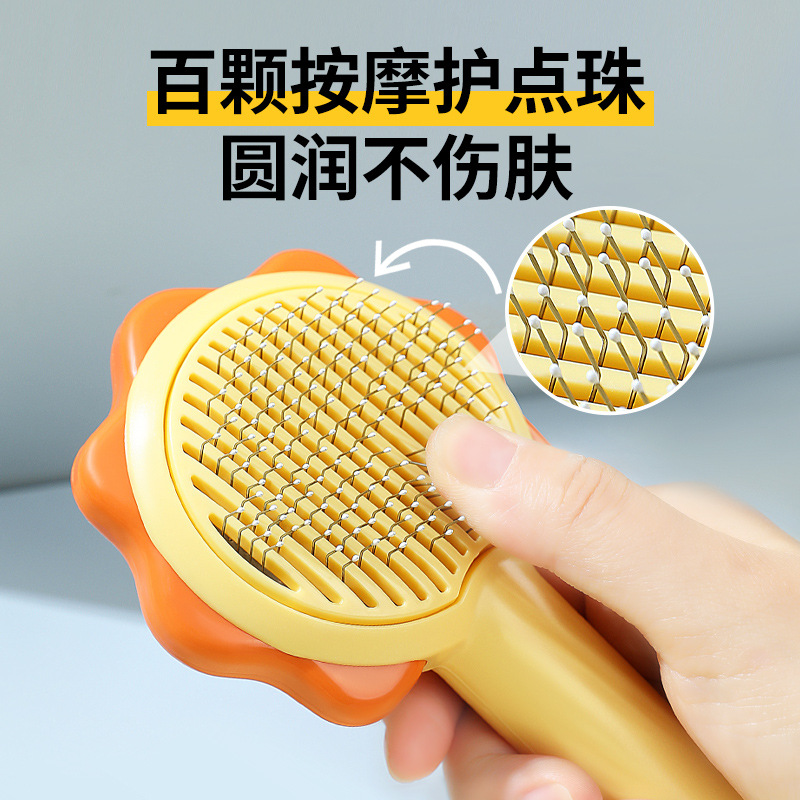 Nuevo girasol mascota depilación nudo peine de un solo clic depilación perro peine cepillo de pelo gato depilación peine venta al por mayor