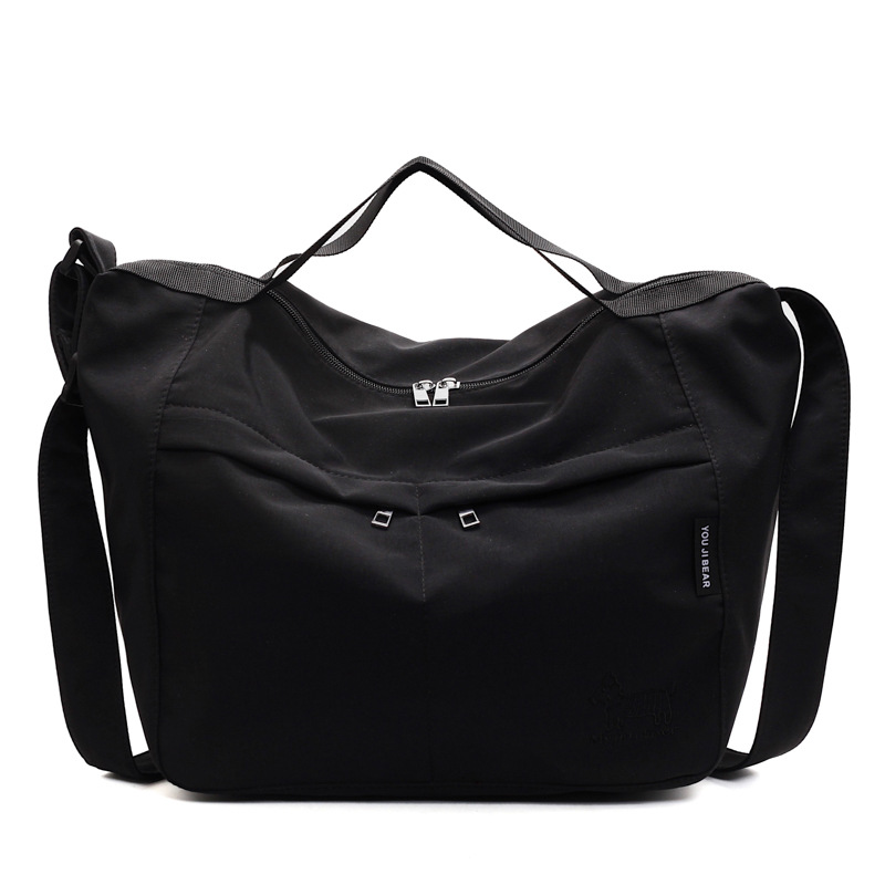 Bolso tote de lona de gran capacidad explosivo transfronterizo 2025 nuevo estilo de clase bolso de mensajero de ocio bolso de viaje femenino