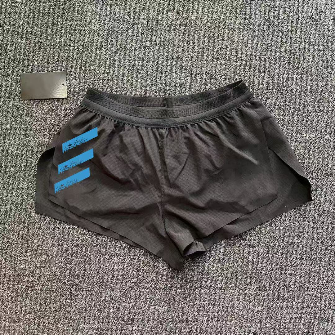 スポーツランニング三分トレーニングパンツ男性プロマラソン側開帯ライニング速乾通気陸上パンツ