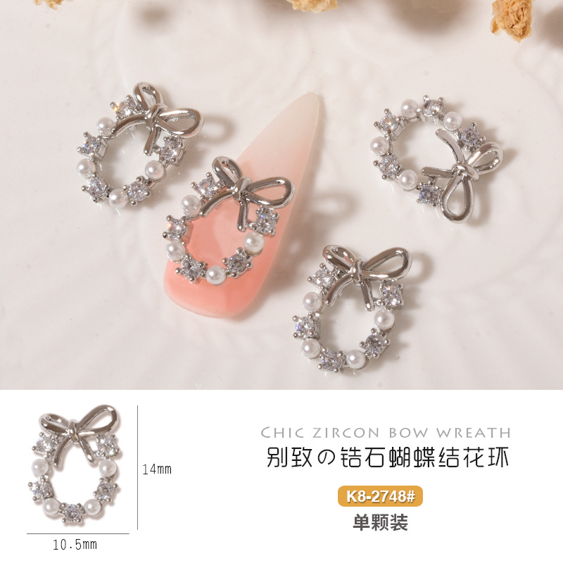 2023 Internet celebridad clavo circón Luz de lujo guirnalda de Navidad popular arco diamante tridimensional perla accesorios de uñas diamante