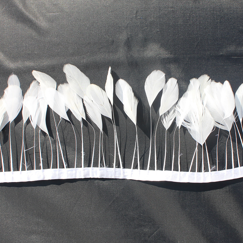 供应色白色撕尾毛包布边 鸡毛布带 羽毛花边 服装辅料 羽毛条