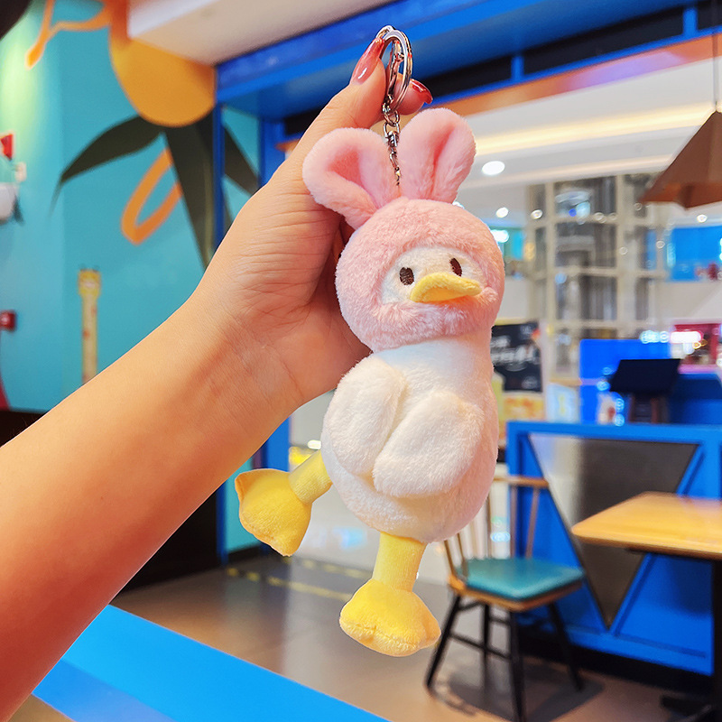 ぬいぐるみのかわいいアクセサリーのぬいぐるみのペンダント卸売りのおもちゃの子供のかばんの漫画の子供の鍵は子供の機械をつかみます。