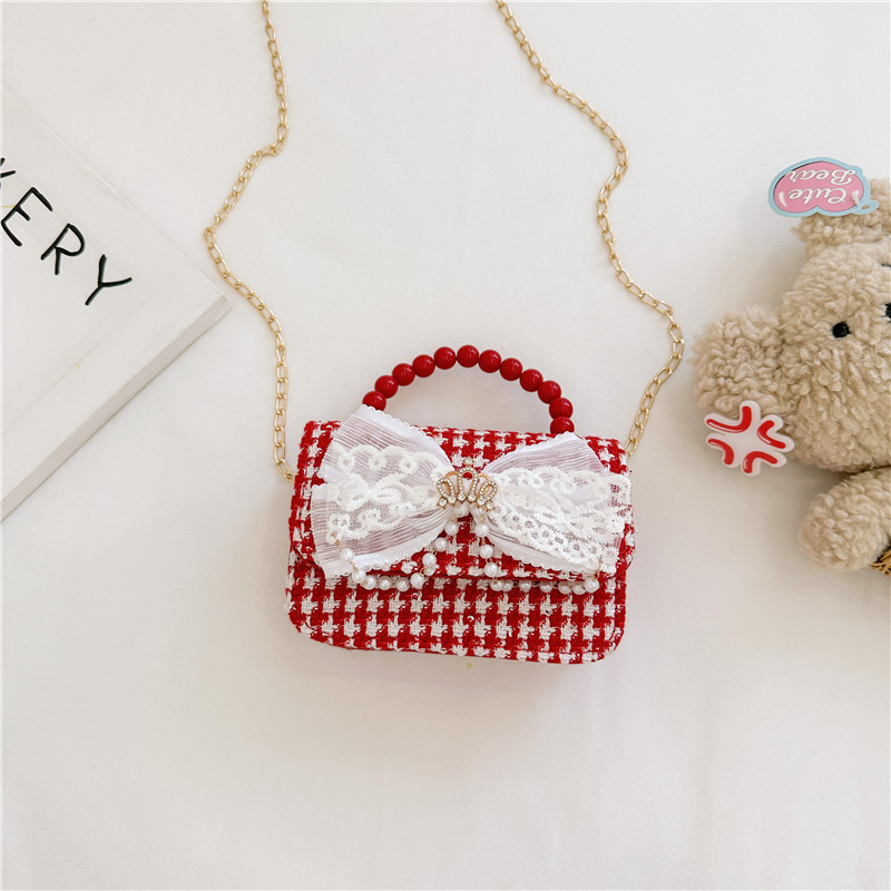 2024 nueva moda lindas bolsas de hombro para niños bolsas de perlas a cuadrícula bolsas extranjeras bolsas de hombro para niñas gran capacidad marea