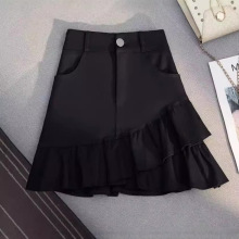 不规则荷叶边半身裙2025年秋季新款高腰a字包臀显瘦黑色牛仔短裙