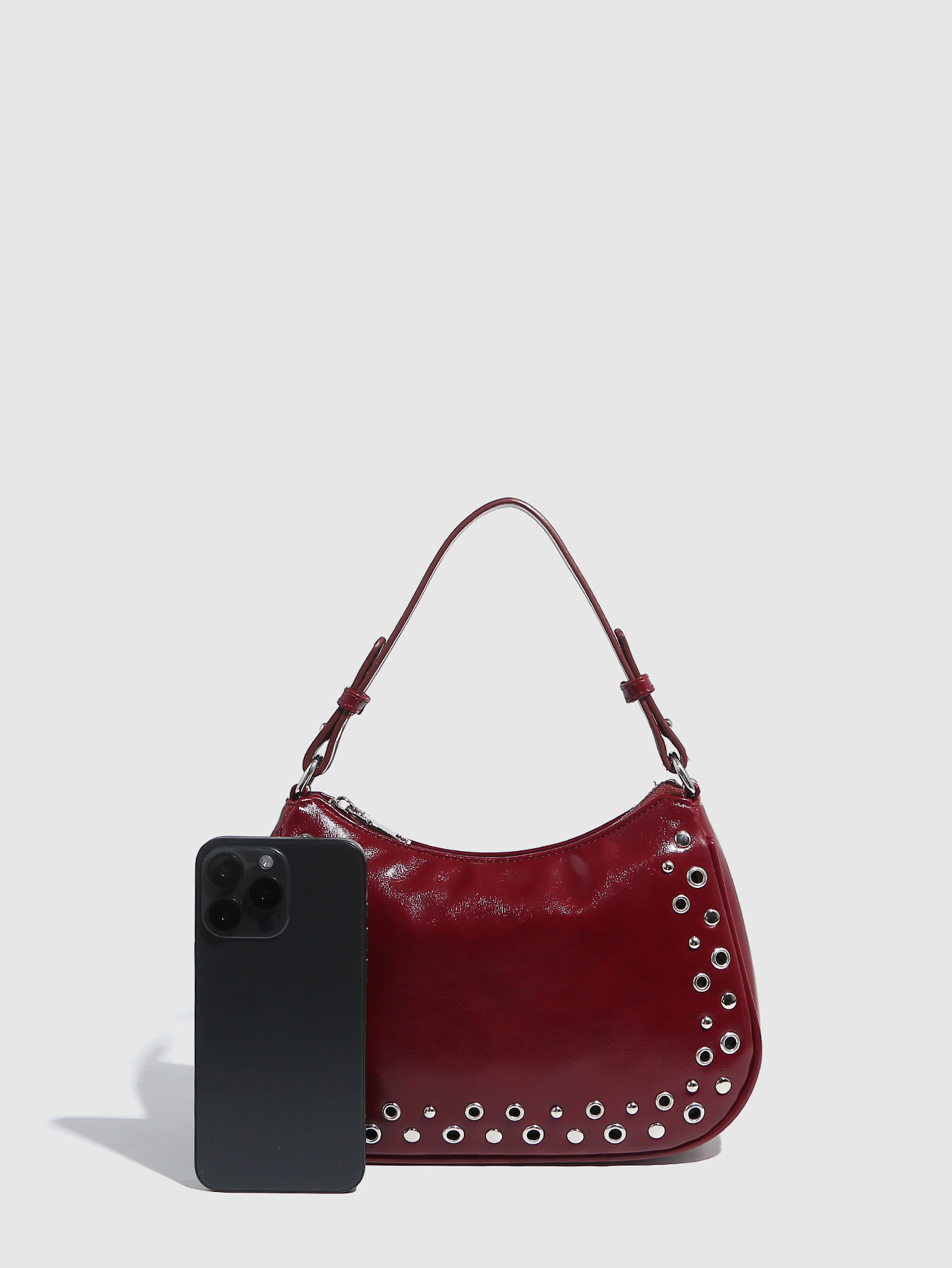 Transfronterizo 2025 nuevo remache hueco ajustable bolso punk bolso de muñeca con cremallera bolso de mujer al por mayor