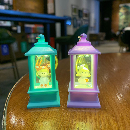 Creative sand bottle flash light keychain pendant cute cartoon small tower lantern night light for students school backpack small ornament wholesale