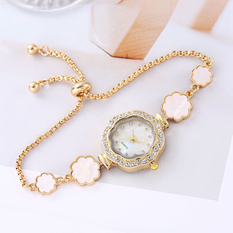 Reloj estudiante femenina transfronteriza Girasol Diamante ins estilo universitario elegante pequeño dial decoración pulsera perezosa