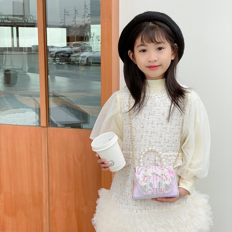 Mochila de moda para niñas, bolso de perla de arco dulce, bolso de mano de 2025 nuevo bolso de cadena para niños