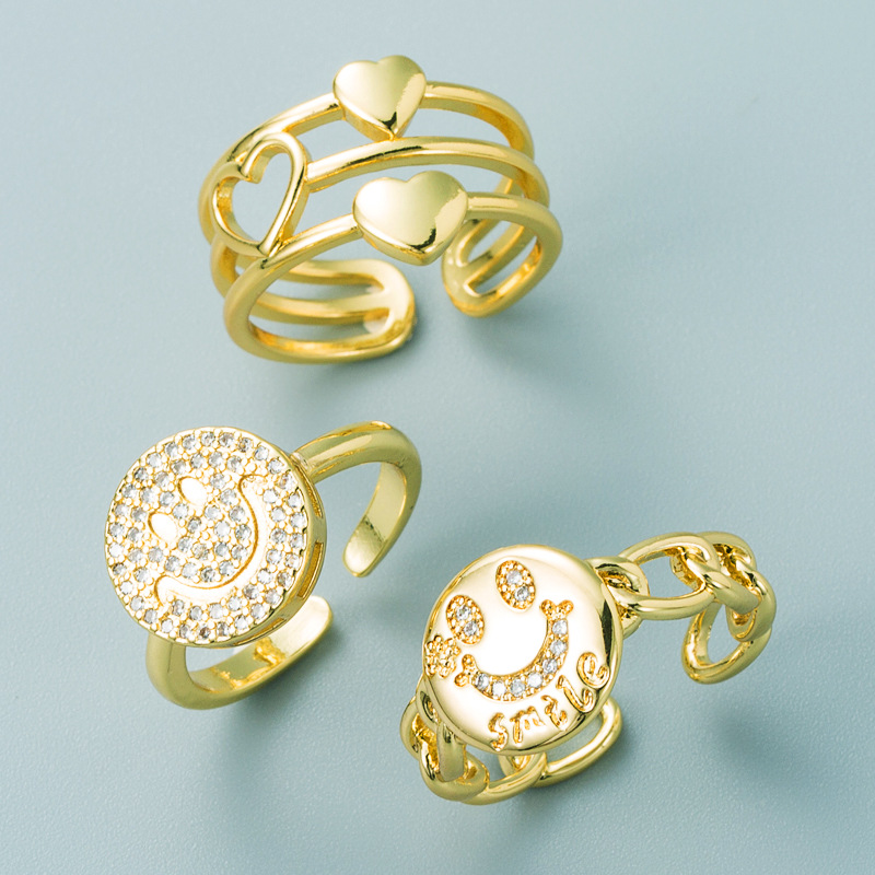 einfacher geometrischer Buchstabe Smiley hohles Herz Kupfer vergoldeter Ring Grohandel Nihaojewelrypicture2