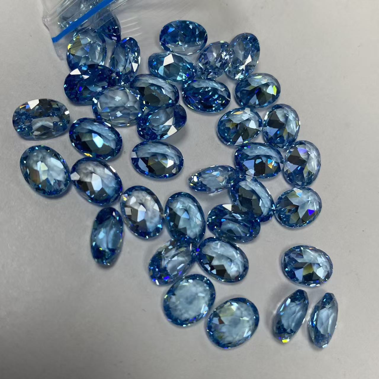 Organic sapphire gemstone for ring with zircon