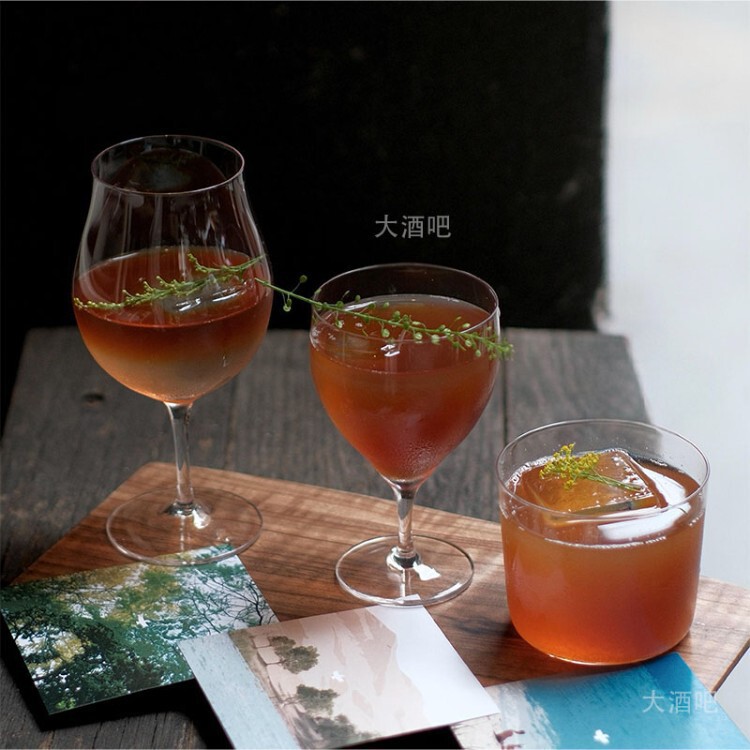 Trendy restaurant tall glass cup for specialty drinks, juice, cocktails, and cold brew coffee Trendy restaurant tall glass cup for specialty drinks, juice, cocktails, and cold brew coffee