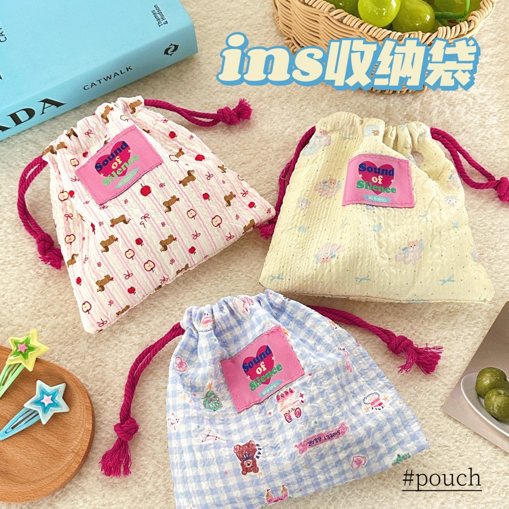 Nuevo lindo paquete de dibujos animados cuerda de dibujo bolsas de espuma portátiles de moda para salir bolsas de maquillaje pequeñas bolsas