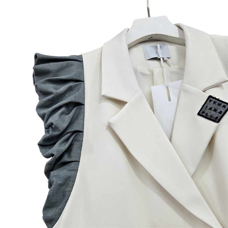 Estación europea de moda chaleco de mujer 2025 otoño y invierno nuevo color contraste manga plegada empalmado chaqueta vaquín cuello delgada