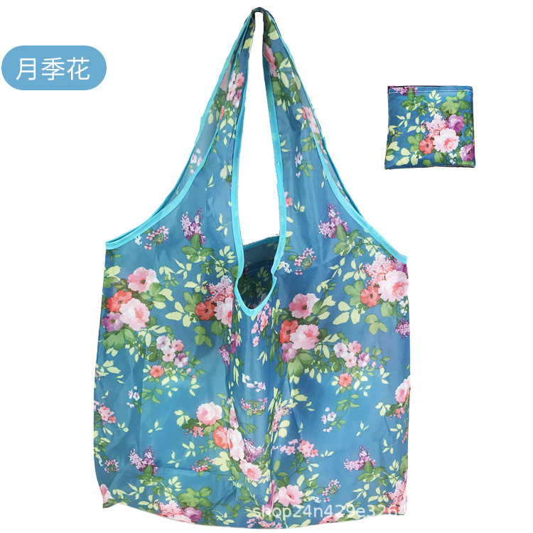 Spot bolsa de compras plegable de gran capacidad Spot bolsa de protección ambiental bolsa plegable bolsa de almacenamiento portátil impresa portátil creativa