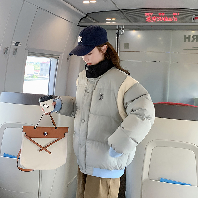 Ropa de béisbol suave coreana de color de invierno para mujeres de nuevo estilo de cuello vertical ropa de pan suelta coreana pequeña chaqueta de algodón suelta