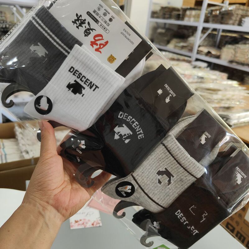 Autumn new all-in-one machine seamless tube men's and women's tide brand sports running cartoon letters cotton socks wholesale