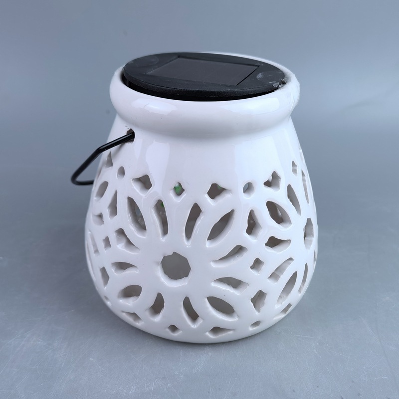 Lámpara solar de venta caliente transfronteriza, lámpara colgante de inducción al aire libre hueca, cielo estrellado creativo, luz nocturna de cerámica para interiores