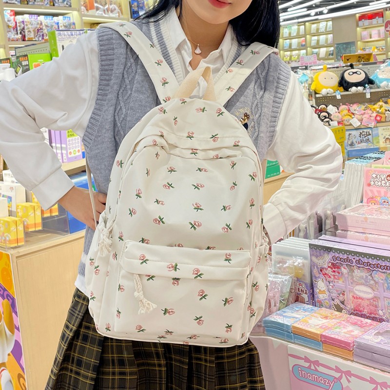 Nueva mochila de moda de flores pequeñas de estilo pastoral, mochila de estudiante de gran capacidad, mochila de viaje ligera y simple