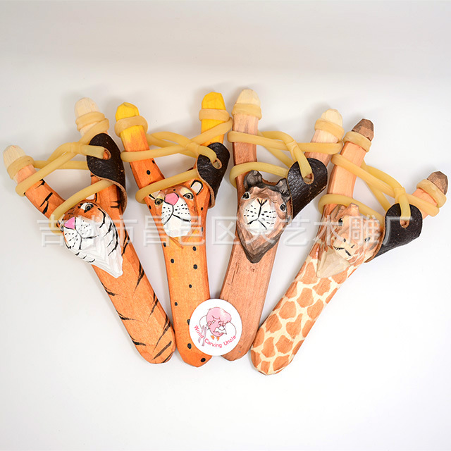 新款实木手柄动物雕刻弹力弹弓 高档户外弹弓枪用品玩具批发