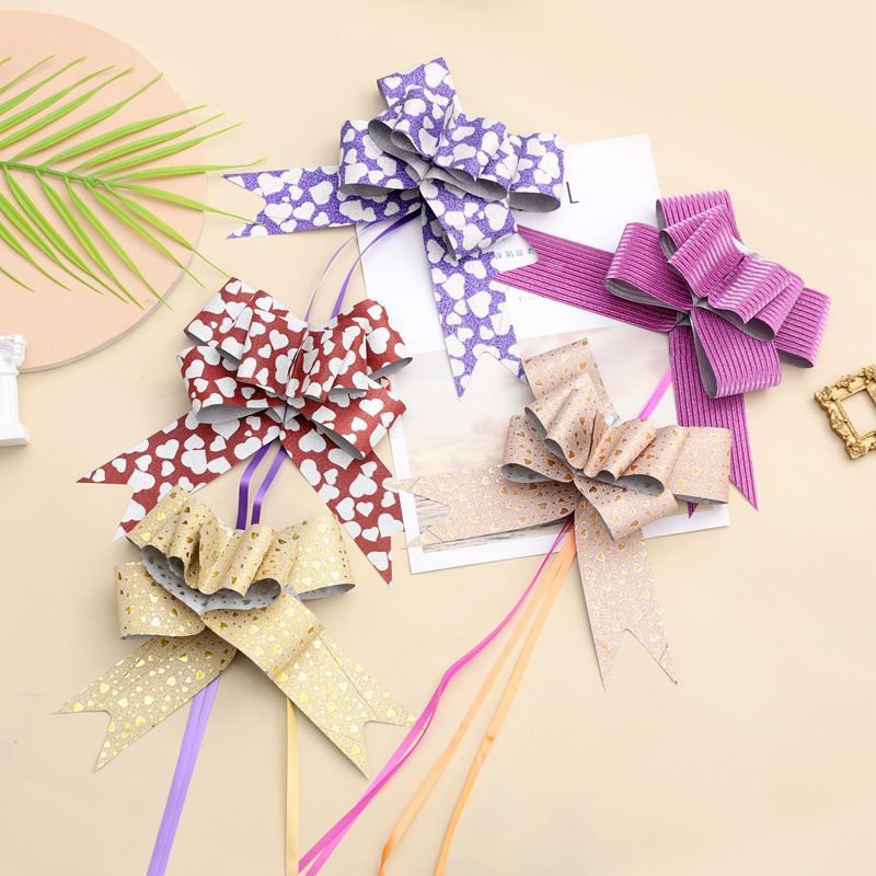 Comercio exterior transfronterizo 50 arco de impresión brillo flor tirada a mano regalo de Navidad embalaje de flores flash diamante tire flor cinta