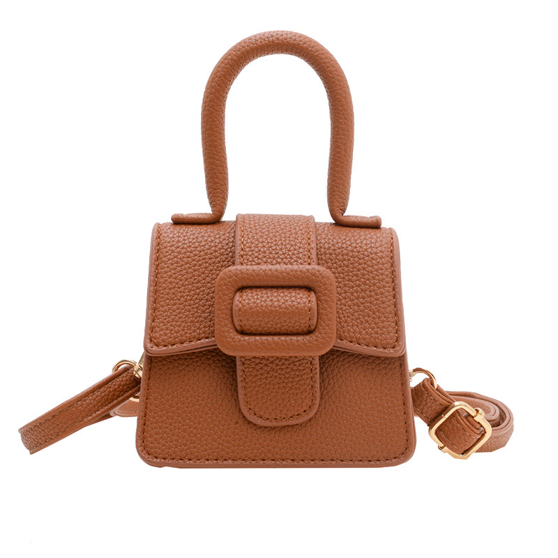 Bolsa para niños Otoño e Invierno Nueva moda europea y americana patrón de lychee mini bolsa de sillín retro hebilla de herradura bolso de las niñas