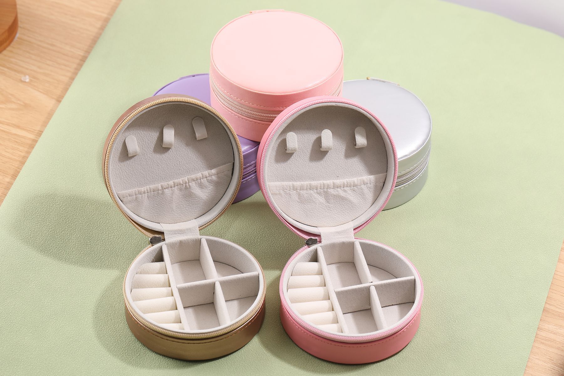 Runde tragbare Schmuckschatulle PU Schmuck-Aufbewahrungsbox Schmuck-Ohrringe-Ring-Organizer grenzüberschreitender Bestseller für den Außenhandel