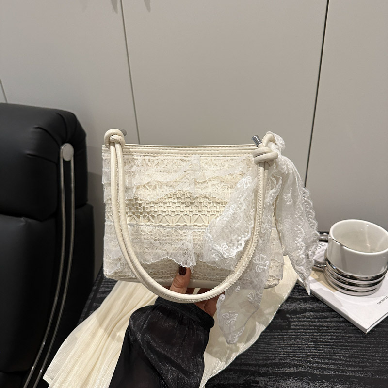 Bolso de mujer 2025 nuevo estilo casual dulce moda coreana estilo occidental textura salvaje bolso de cubo de un solo hombro mujer de alto valor