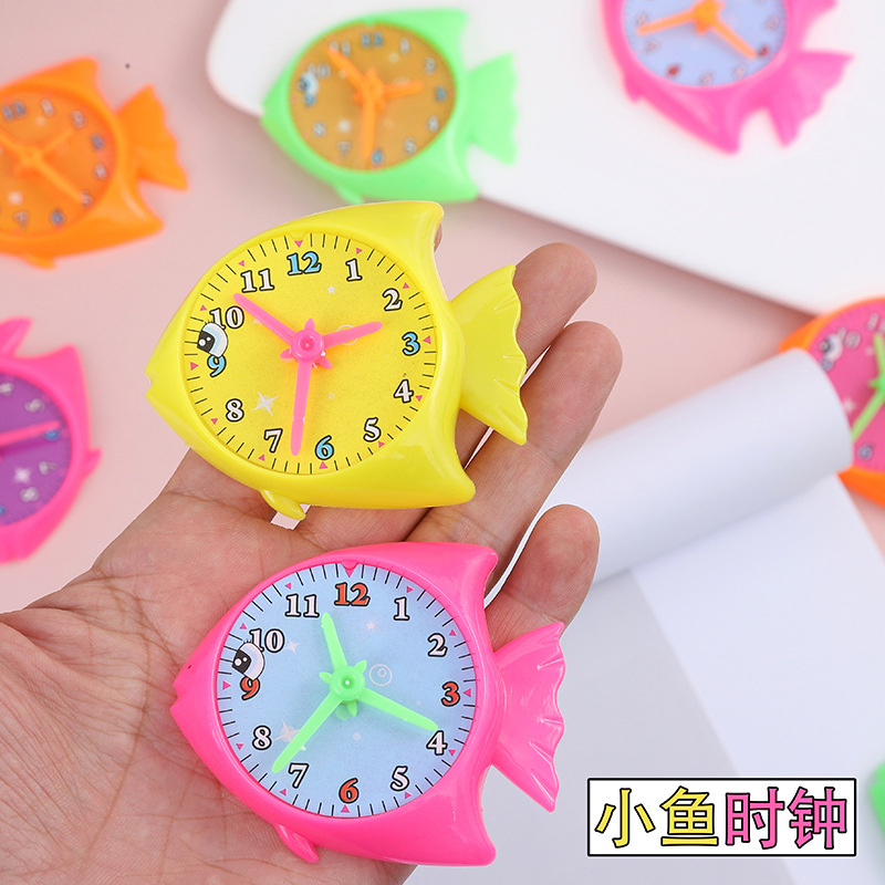 Educación infantil creativa de dibujos animados reloj aprendiz pequeño reloj despertador alrededor de la temporada escolar empujar pequeños regalos