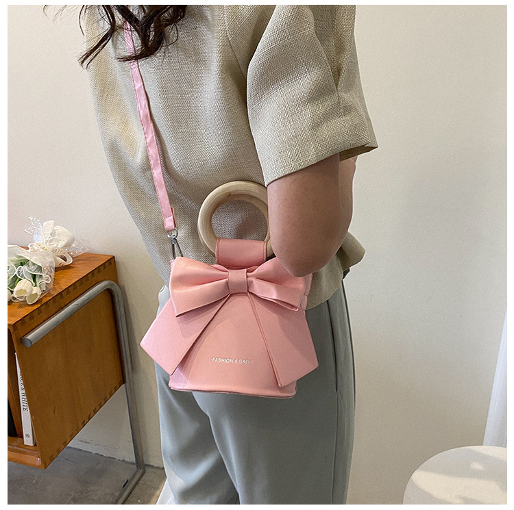 455g Weight Synthetic Leather Lining Material Sewing Thread Fashion Element Magnetic Buckle Closure Type Single Shoulder Strap, Double Handle Strap Type Bucket Bag Bags Type Casual Occasion Pu Leather Material Bow Knot Pattern All Seasons Season Women's Gender Elegant Style Bucket Shape Small Size Women's Small Pu Leather Bow Knot Elegant Sewing Thread Bucket Magnetic Buckle Bucket Bag 无