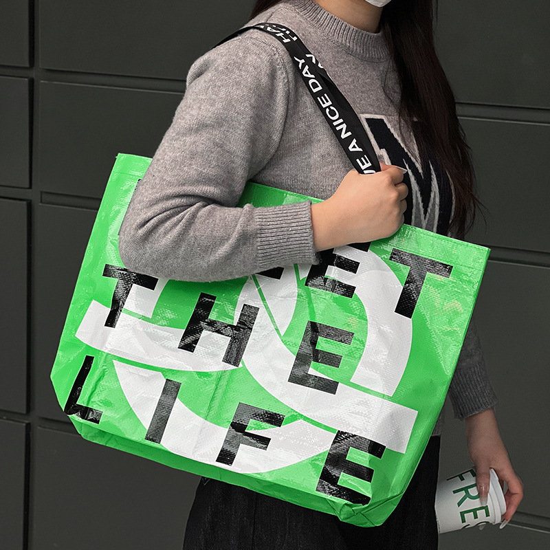 时尚字母手提编织袋批发展会活动广告礼品购物超大容量防水蛇皮袋