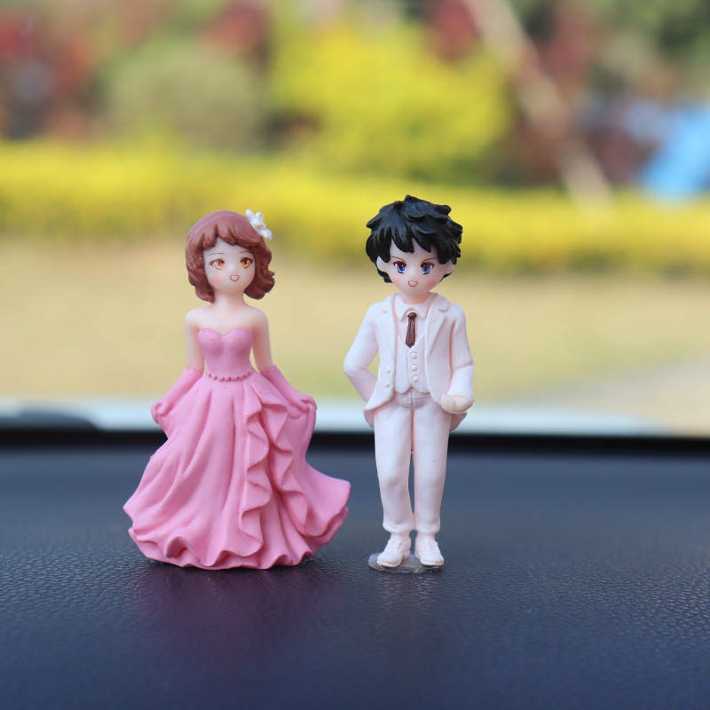 Nuevos accesorios de automóviles consola al por mayor muñecas creativas de dibujos animados accesorios de automóviles decoraciones de boda pareja