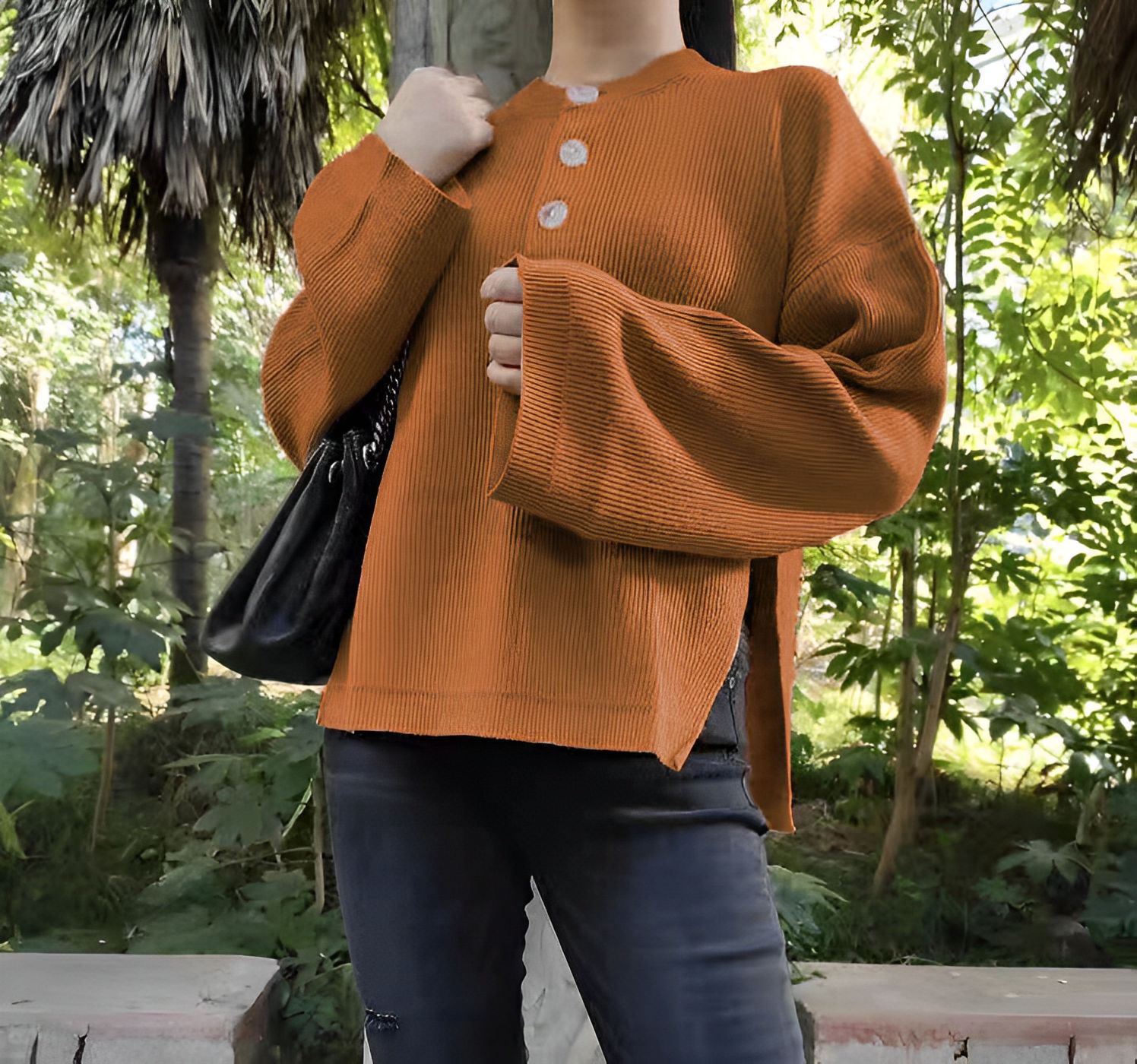 Women's all-in-one solid color three-button long sleeve loose side slit knit sweater_voghion.com