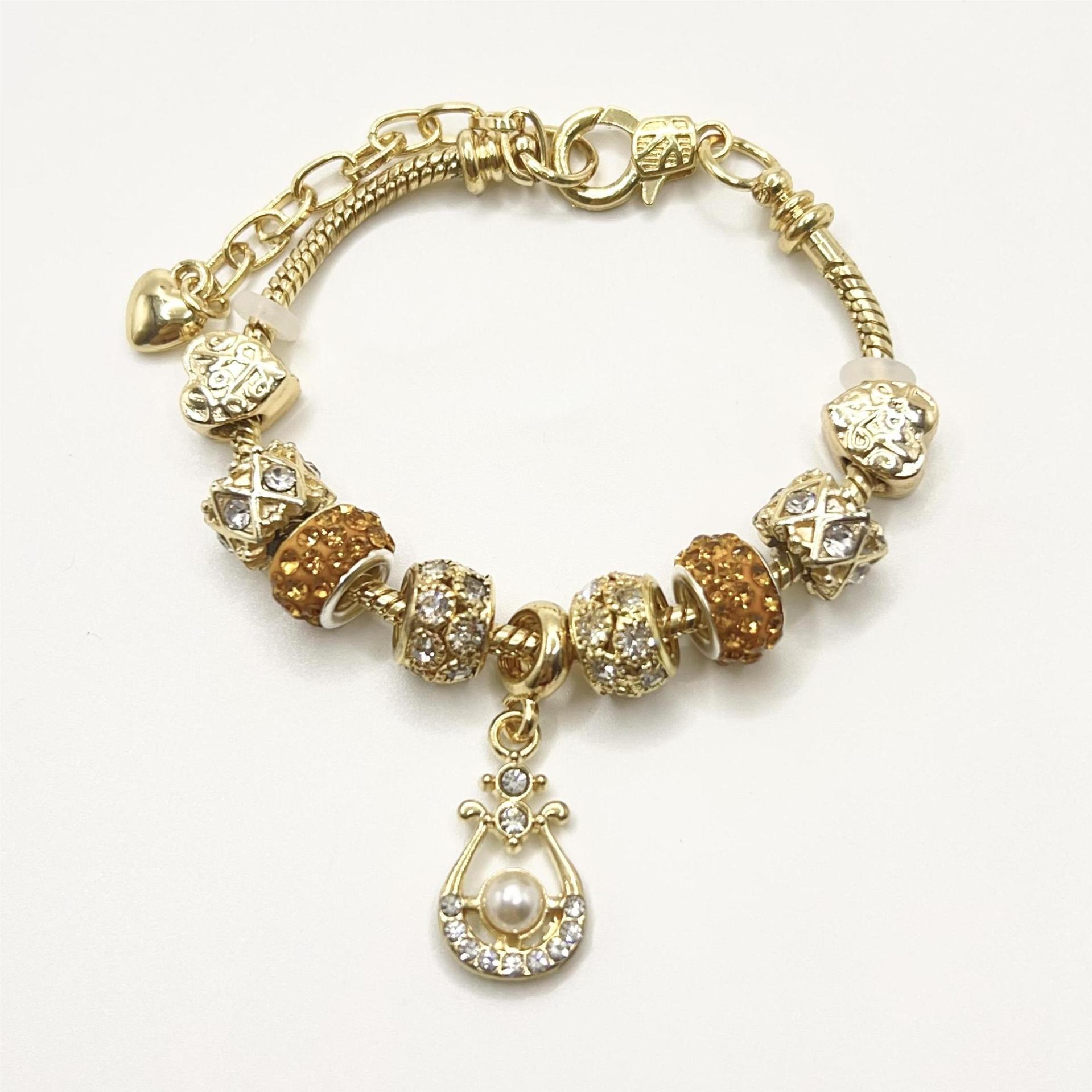 春夏の新型の小清新で甘い少女風のストライプの花の愛の蝶の数珠のブレスレットの透かし彫りのダイヤモンドの手の串