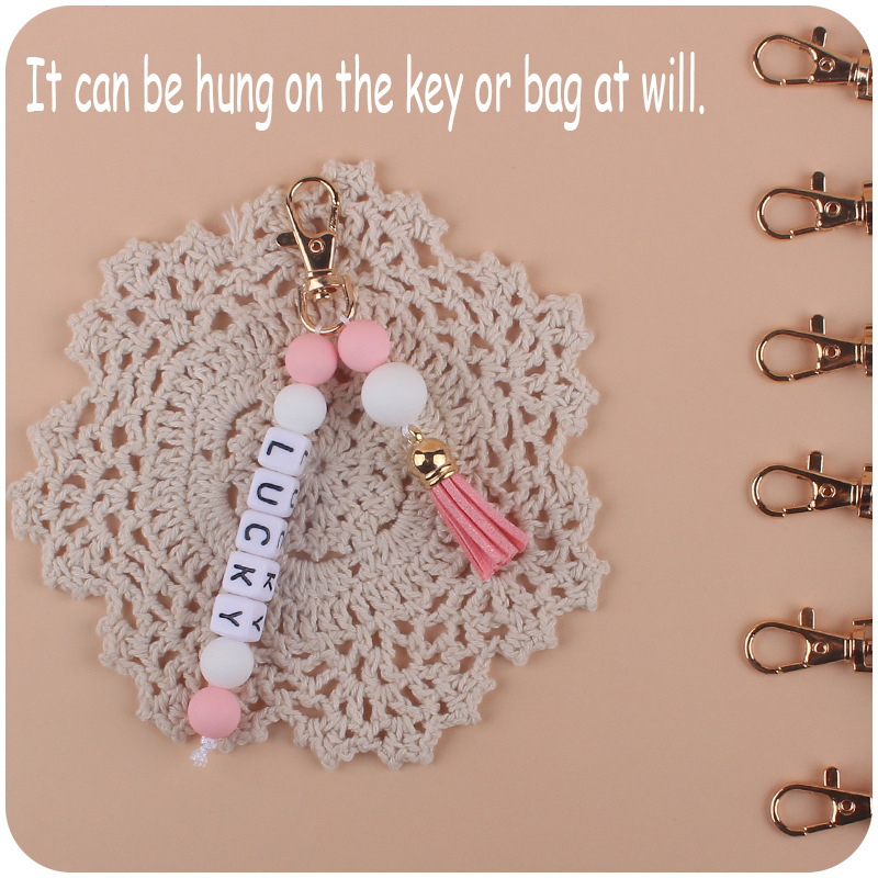 Nuevo creativo borla colgante DIY nombre llavero colgante de cuentas de silicona colgante bolsa colgante AliExpress