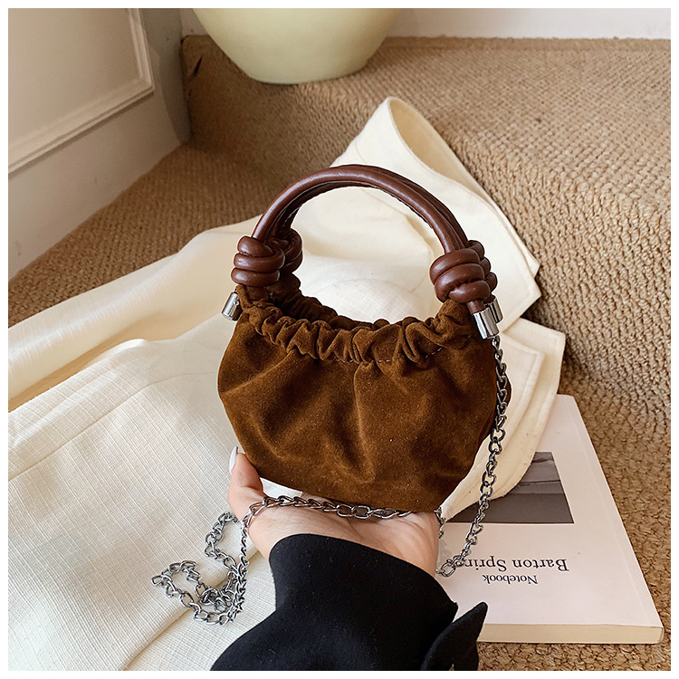 2025 nuevo bolso infantil coreano, mini bolso de ropa de bebé, bolso de hombro para hombres y mujeres, cadena de moda