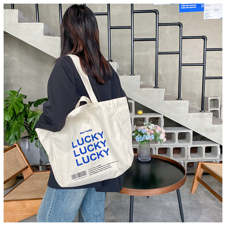 A large-capacity, sturdy Japanese-style canvas bag for women, a new 2022 simple bento handbag for girls to go to work undefined
