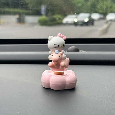 Car ornaments, cute rotating Hello Kitty car