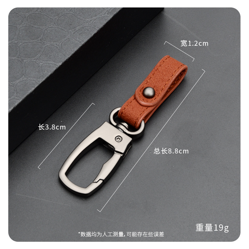 Colgante de llavero de flip de lujo ligero llavero de coche de cuero de alta gama llavero de pareja de moda para hombre